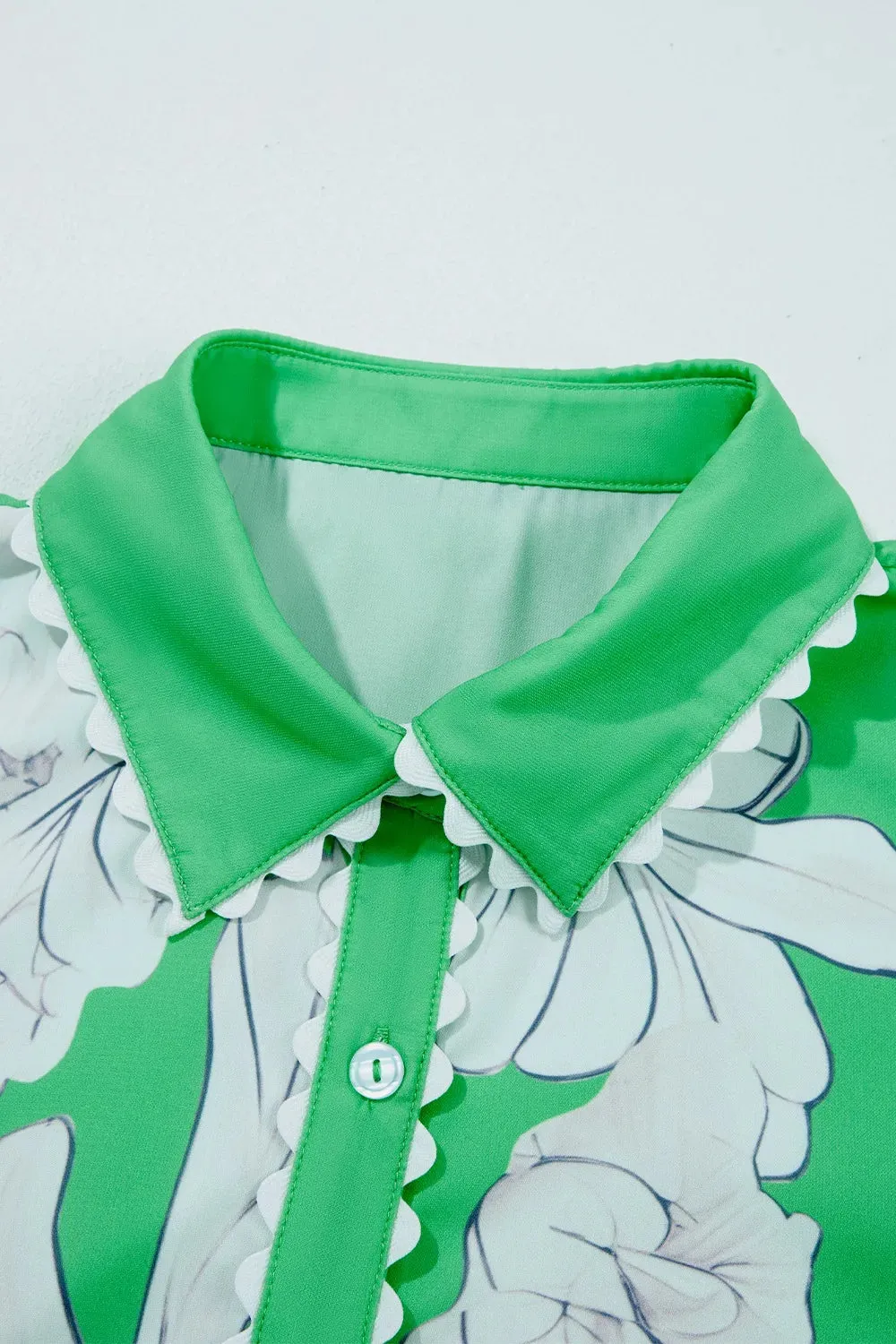 Floral Ric Rac Edge Puff Sleeve Button Up Summer Shirt sold by Charming Charlie product image thumbnail 4