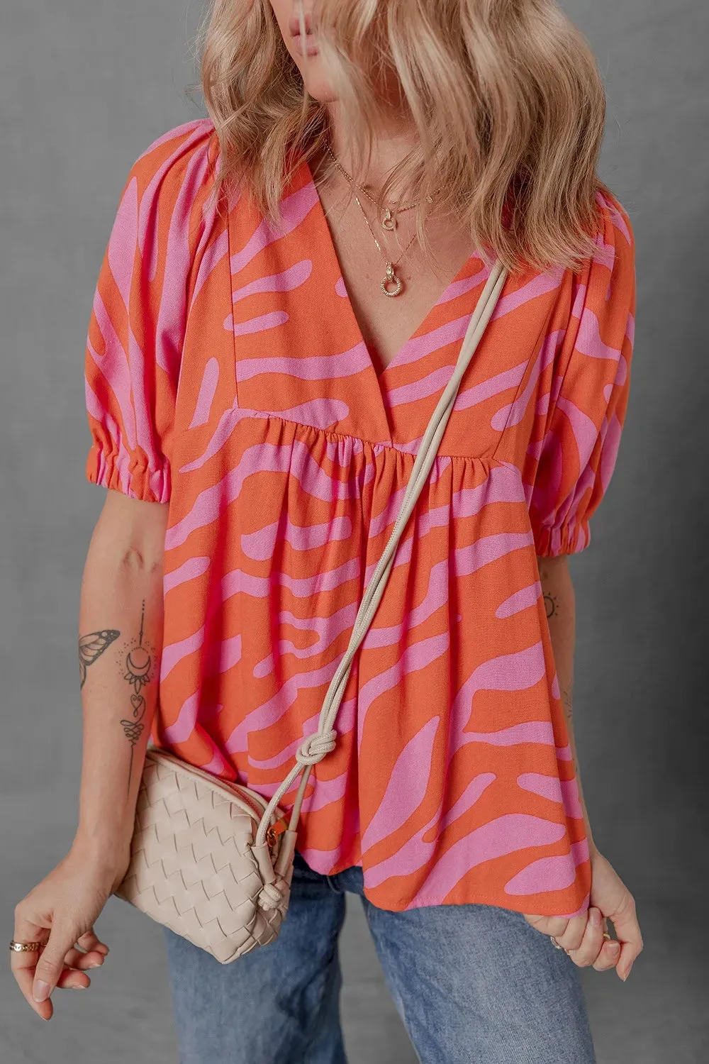 Zebra Stripe Print Ruched Cuff Half Sleeve V Neck Blouse sold by Charming Charlie product image thumbnail 2
