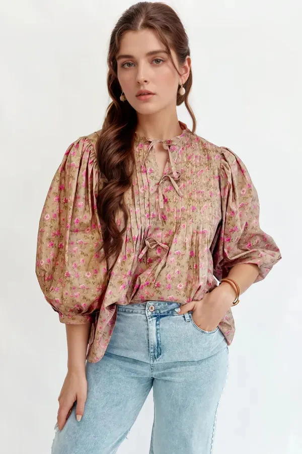 Floral Print Bow Pintuck Bust Half Puff Sleeve Blouse Top sold by Charming Charlie