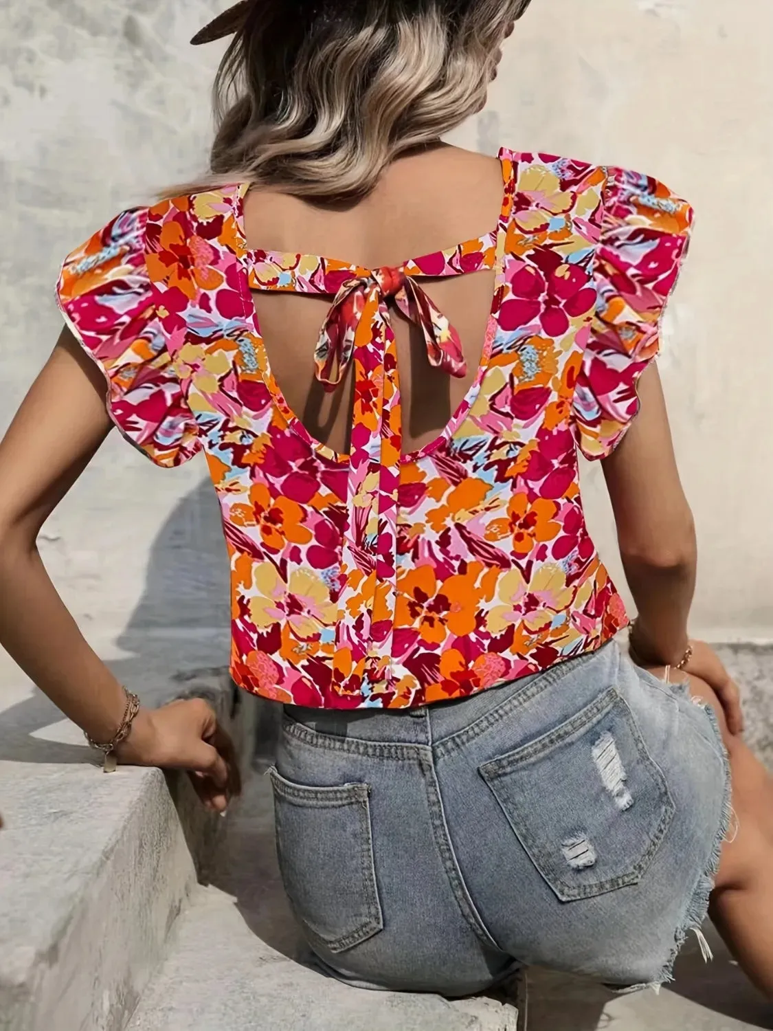 Printed V-Neck Cap Sleeve Blouse sold by Charming Charlie