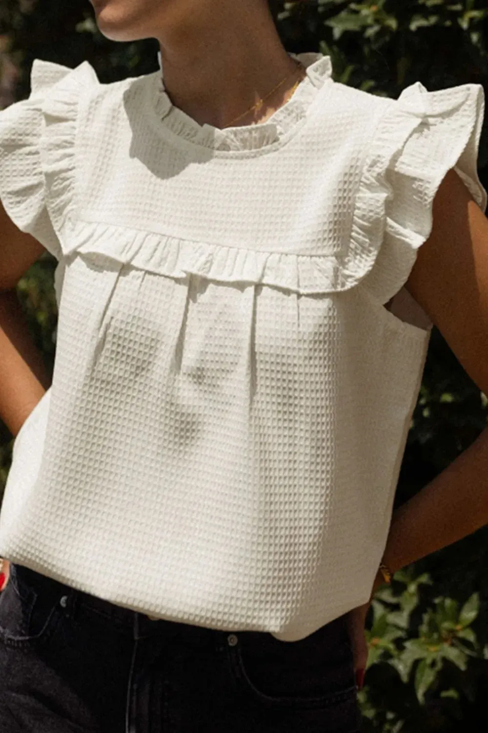 Solid Color Ruffle Trim Waffle Knit Blouse sold by Charming Charlie