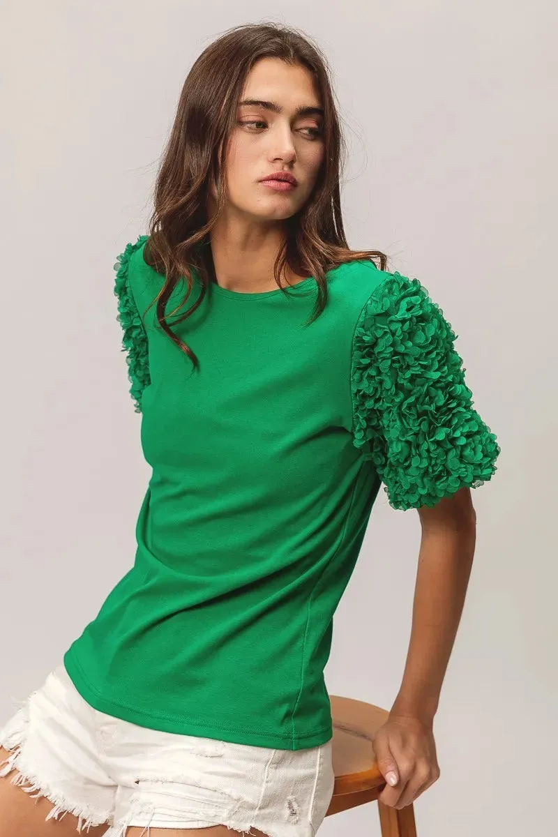 BiBi Short Mesh Flower Sleeve Knit Top sold by Charming Charlie