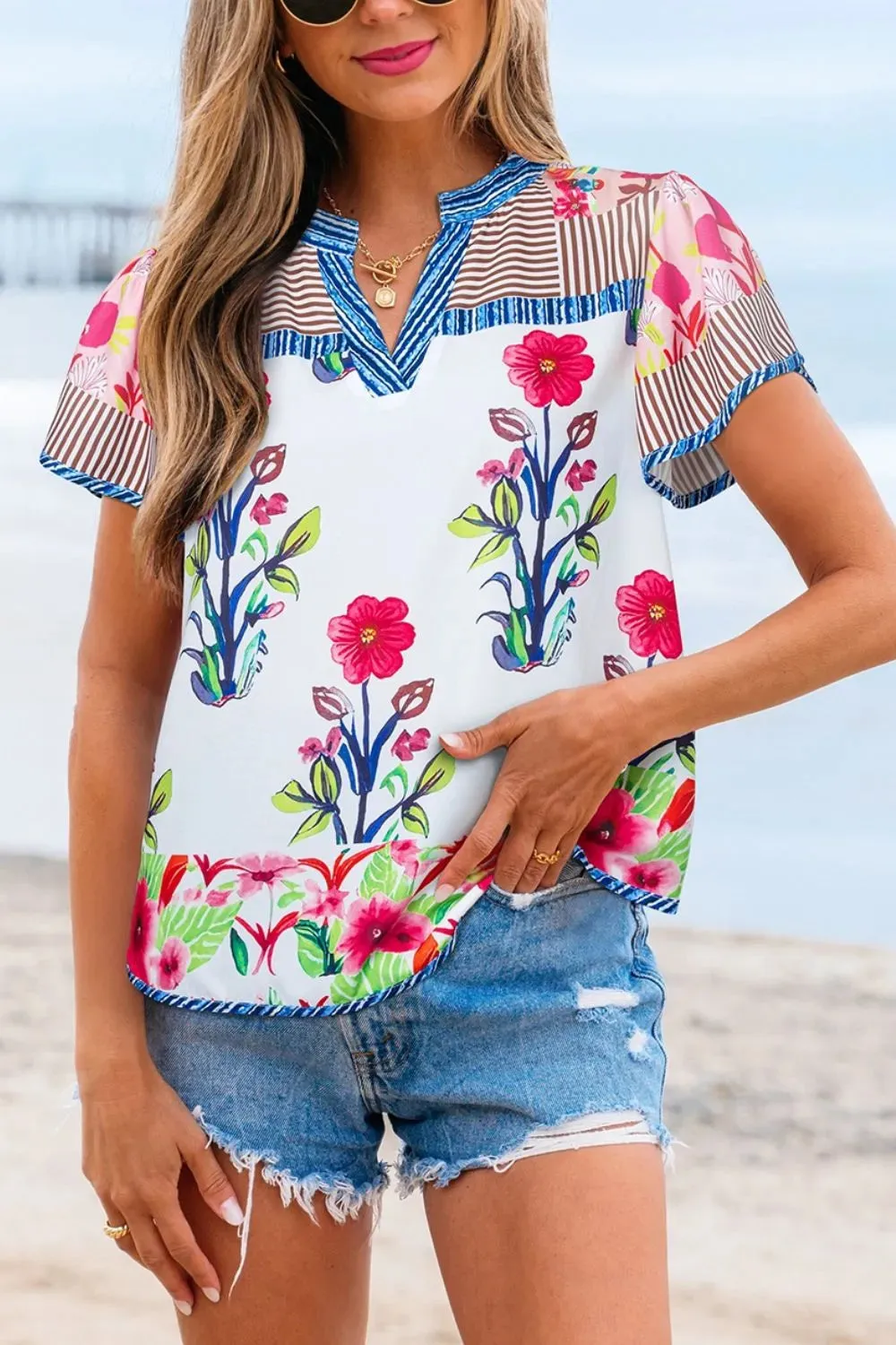 Floral Striped Patchwork Short Sleeve Split Neck Blouse sold by Charming Charlie product image thumbnail 3