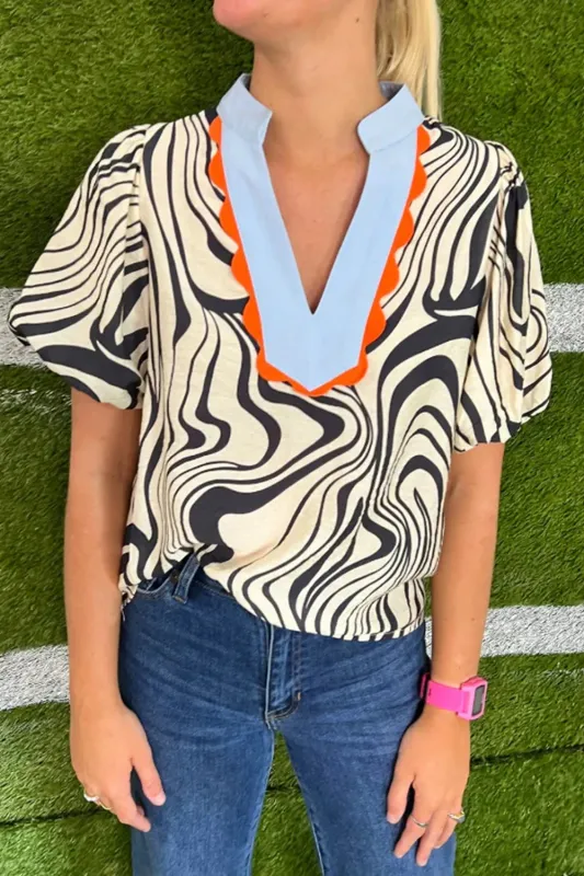 Zebra Stripe Print Contrast V-Neck Ricrac Detail Short Sleeve Blouse Top sold by Charming Charlie