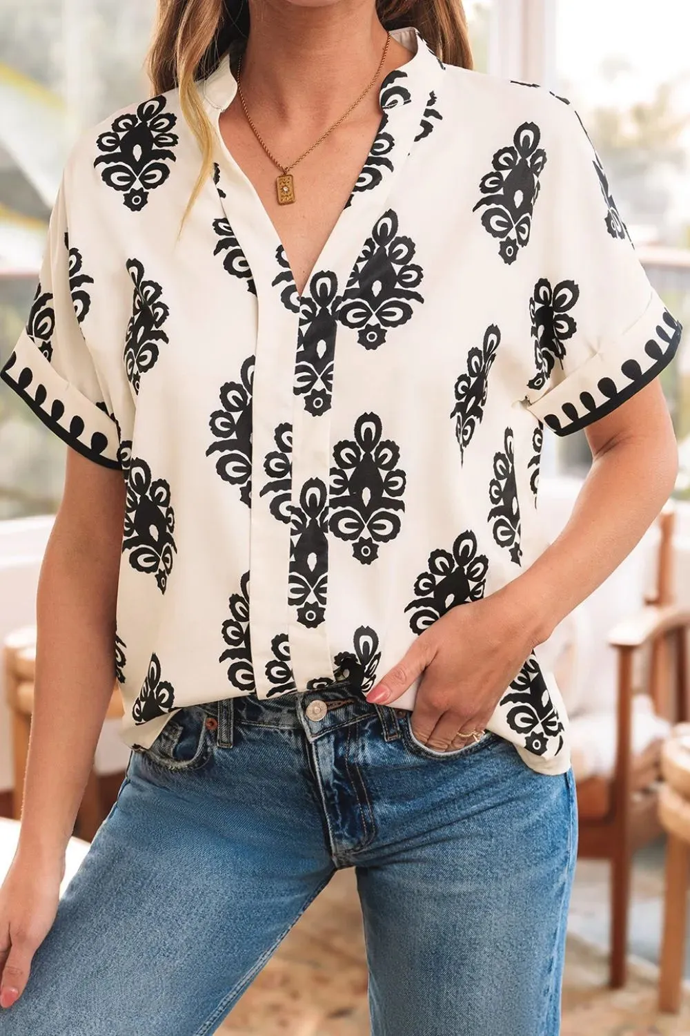 Printed Short Sleeve Loose Blouse sold by Charming Charlie