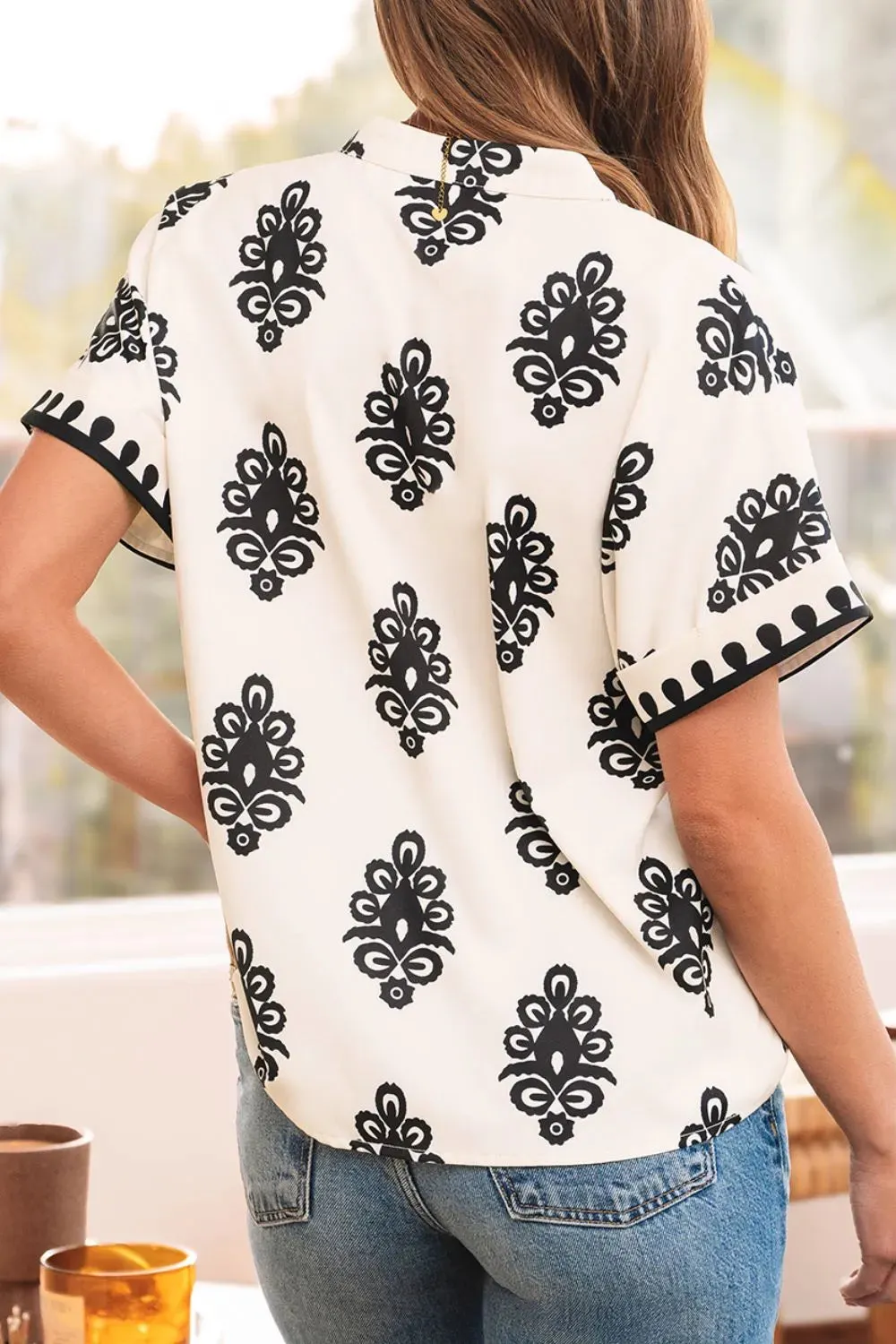 Printed Short Sleeve Loose Blouse sold by Charming Charlie product image thumbnail 4