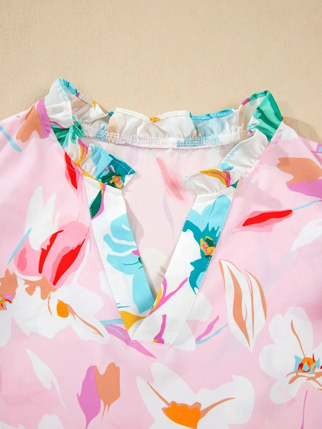 Printed Notched Cap Sleeve Blouse sold by Charming Charlie product image thumbnail 5