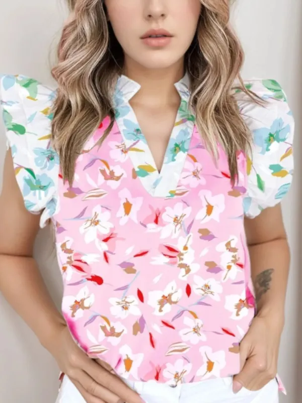 Printed Notched Cap Sleeve Blouse sold by Charming Charlie