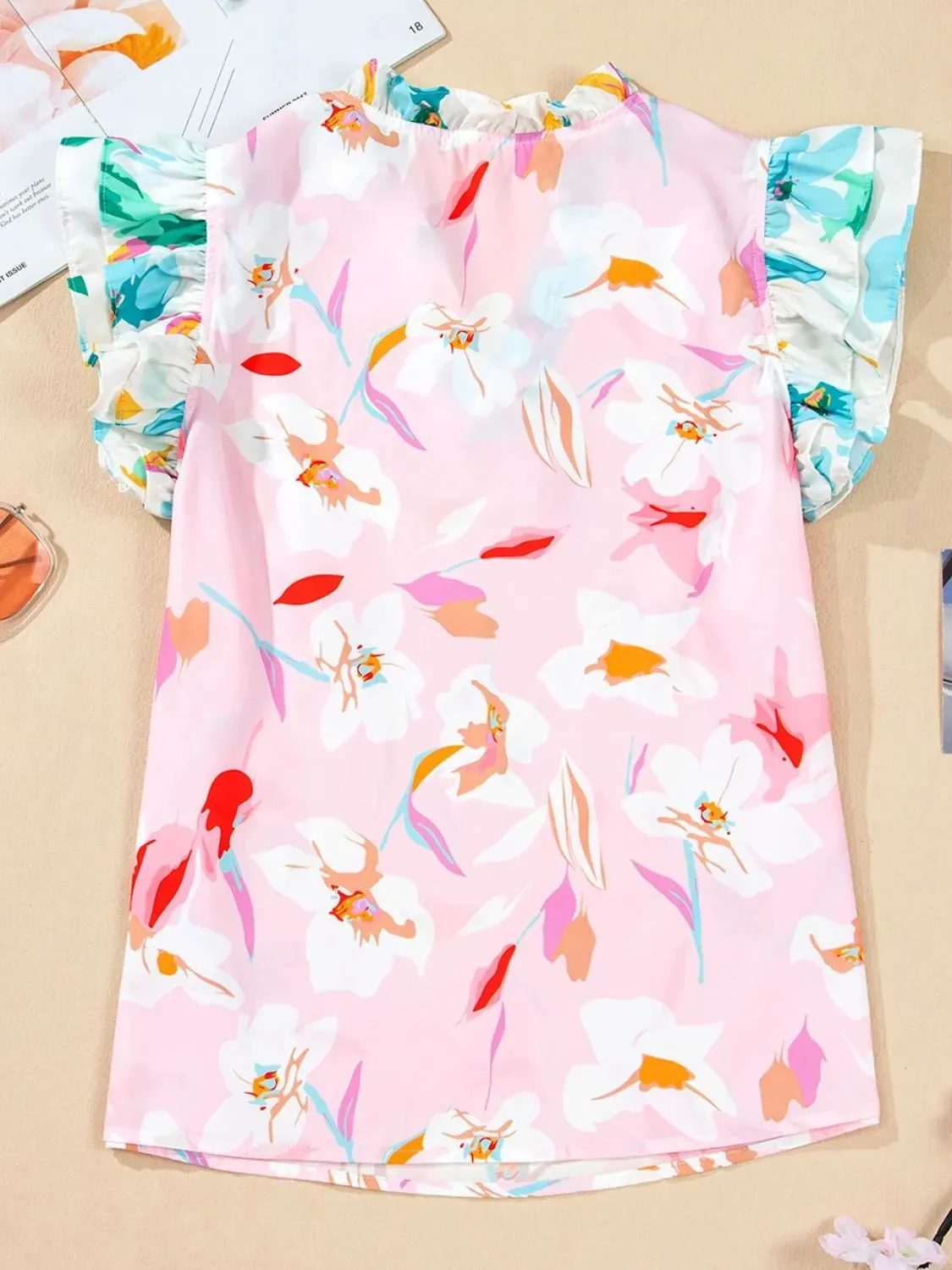 Printed Notched Cap Sleeve Blouse sold by Charming Charlie product image thumbnail 4