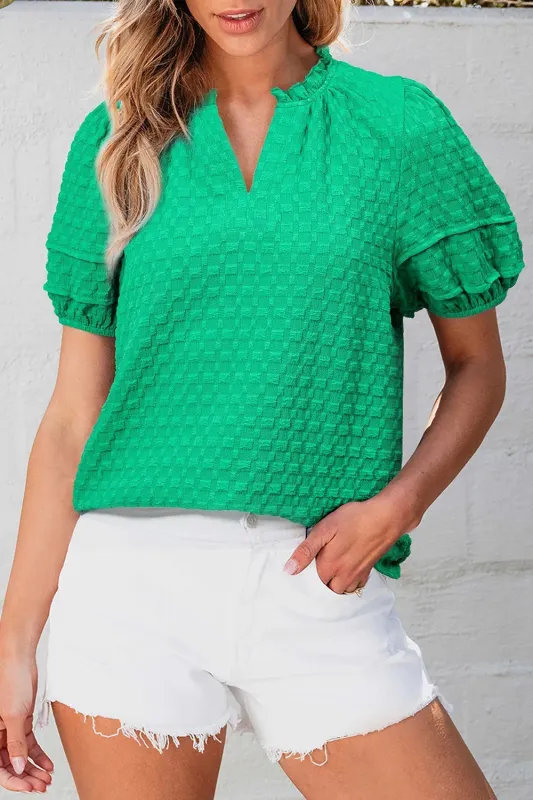 Textured Puff Short Sleeve Notched Top sold by Charming Charlie