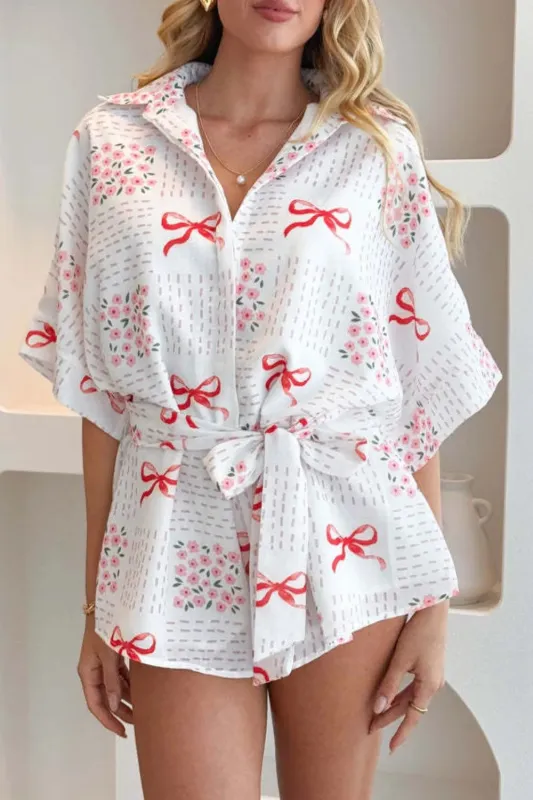 Printed Tie Waist Romper sold by Charming Charlie