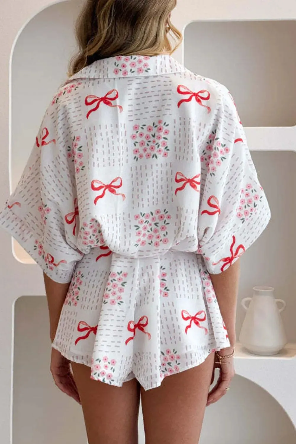 Printed Tie Waist Romper sold by Charming Charlie product image thumbnail 3