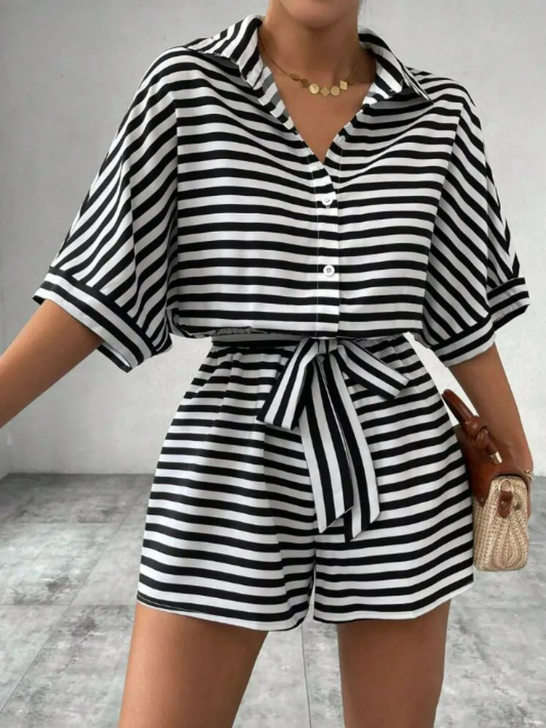 Tie Waist Half Sleeve Romper sold by Charming Charlie