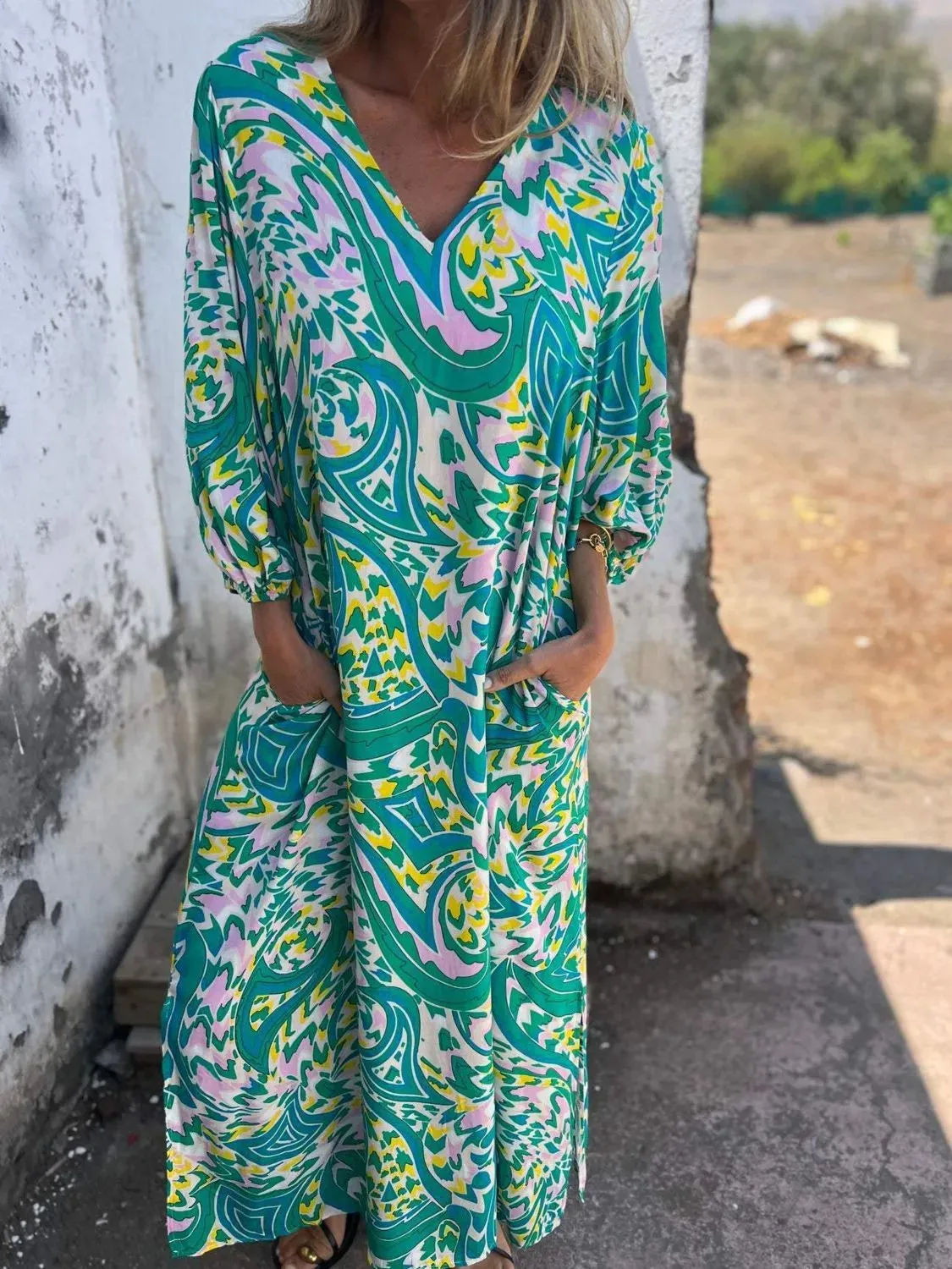 Full Size Printed V-Neck Dress with Pockets Plus Size sold by Charming Charlie