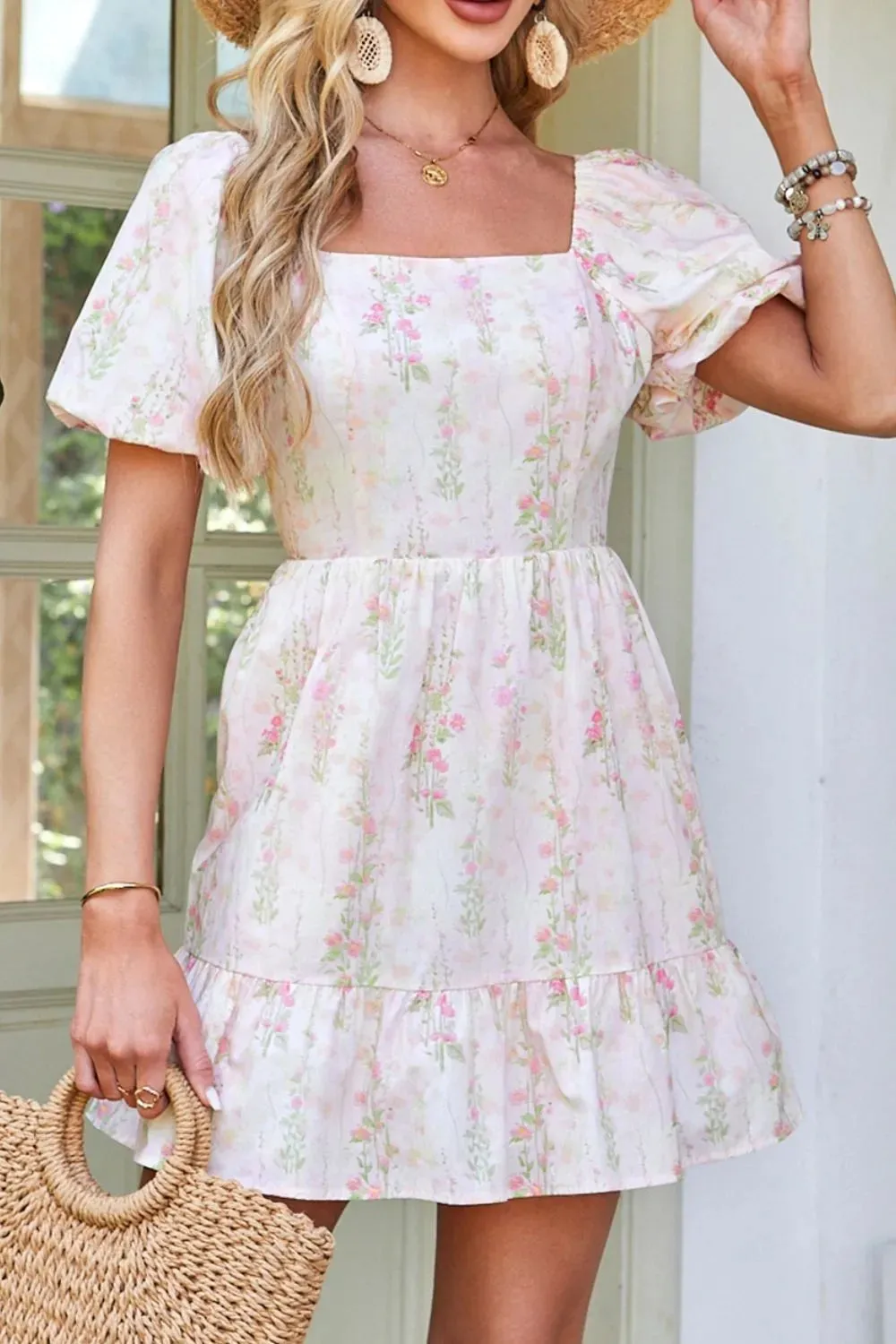 Floral Puff Sleeve Square Neck Knotted Open Back Ruffled Mini Dress sold by Charming Charlie