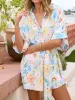 Printed Half Sleeve Tie Waist Romper sold by Charming Charlie