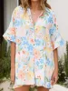 Printed Half Sleeve Tie Waist Romper sold by Charming Charlie