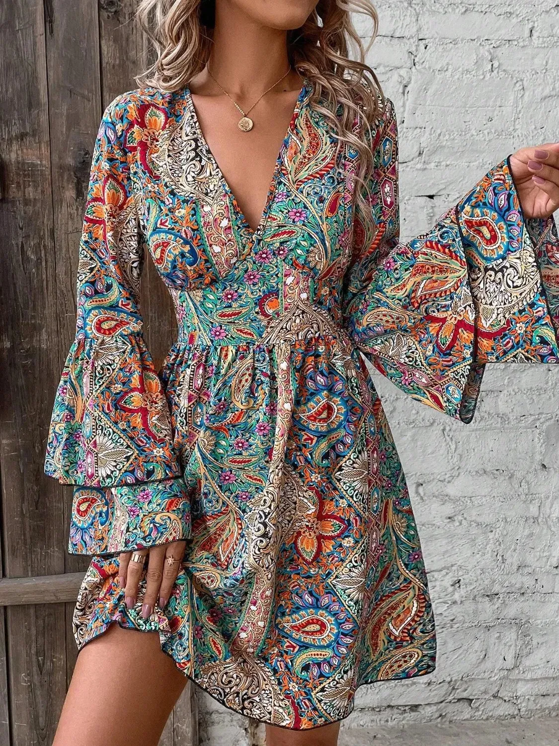 Printed V-Neck Flounce Sleeve Dress sold by Charming Charlie