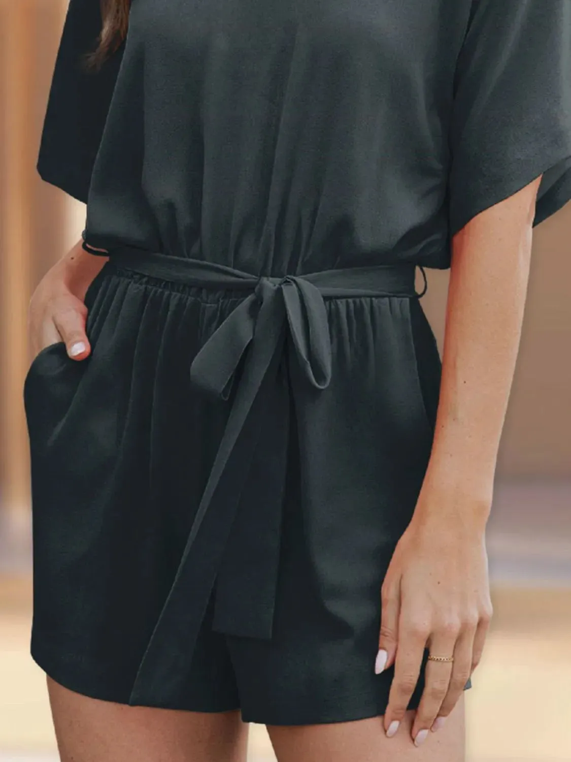 V-Neck Half Sleeve Tie Waist Romper sold by Charming Charlie product image thumbnail 3