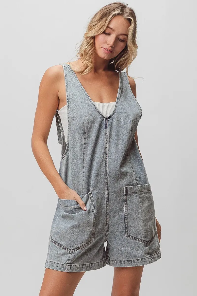 BiBi Patch Vintage Washed Denim Shortall sold by Charming Charlie