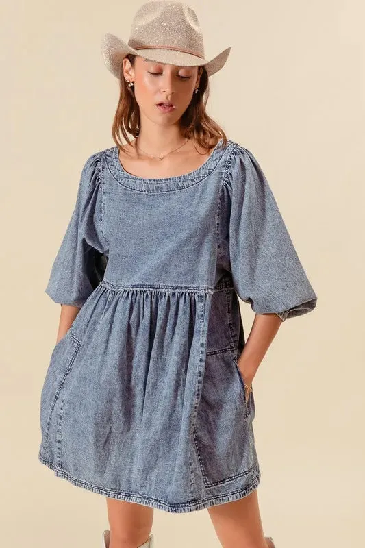 SO ME Washed and Distressed Mini Denim Dress made by Charming Charlie