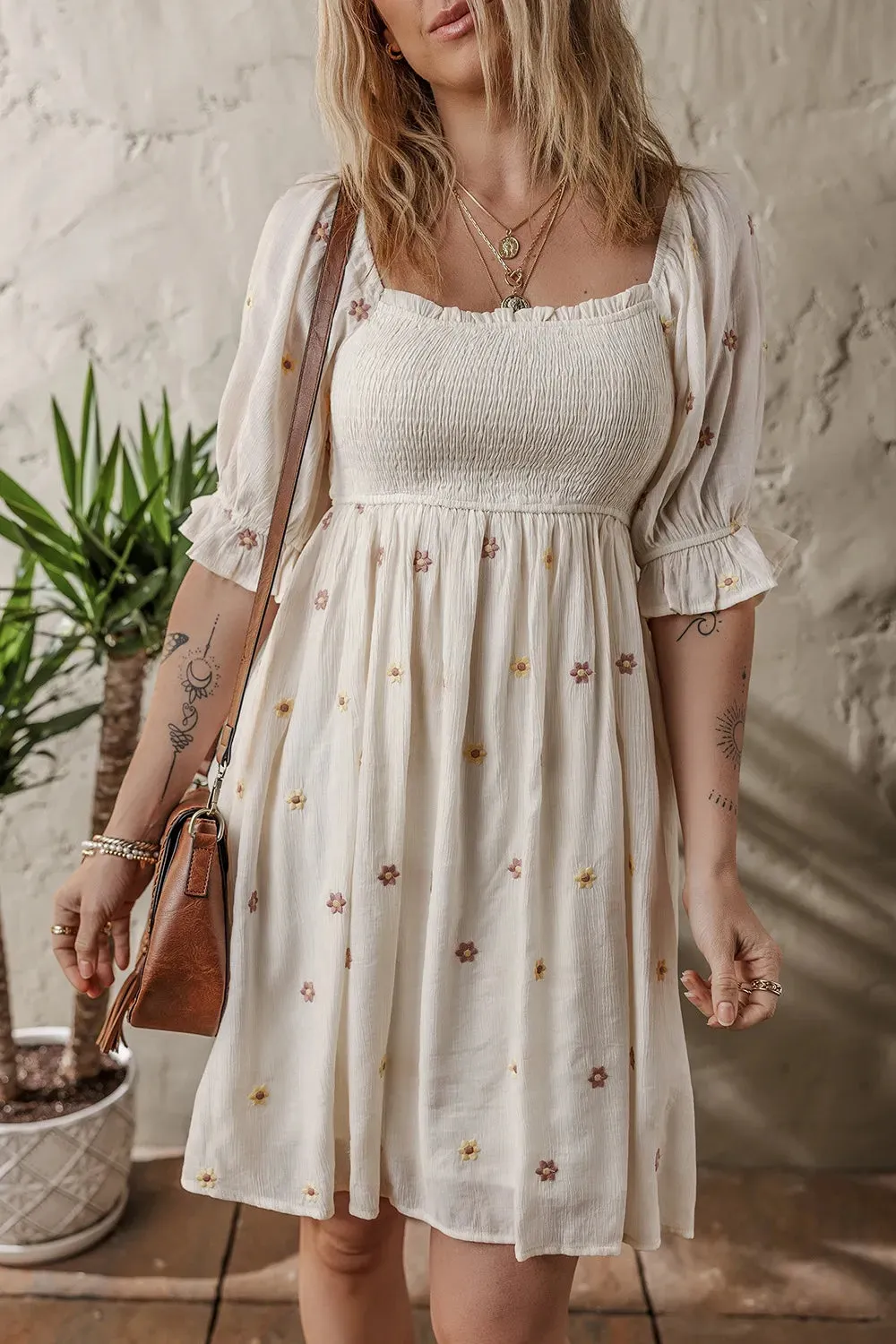 Embroidered Flower Smocked Bust Half Puff Sleeve Empire Waist Textured Flowy Dress sold by Charming Charlie product image thumbnail 4