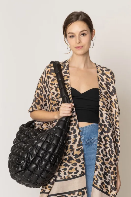 Large Quilted PU Bag sold by Charming Charlie