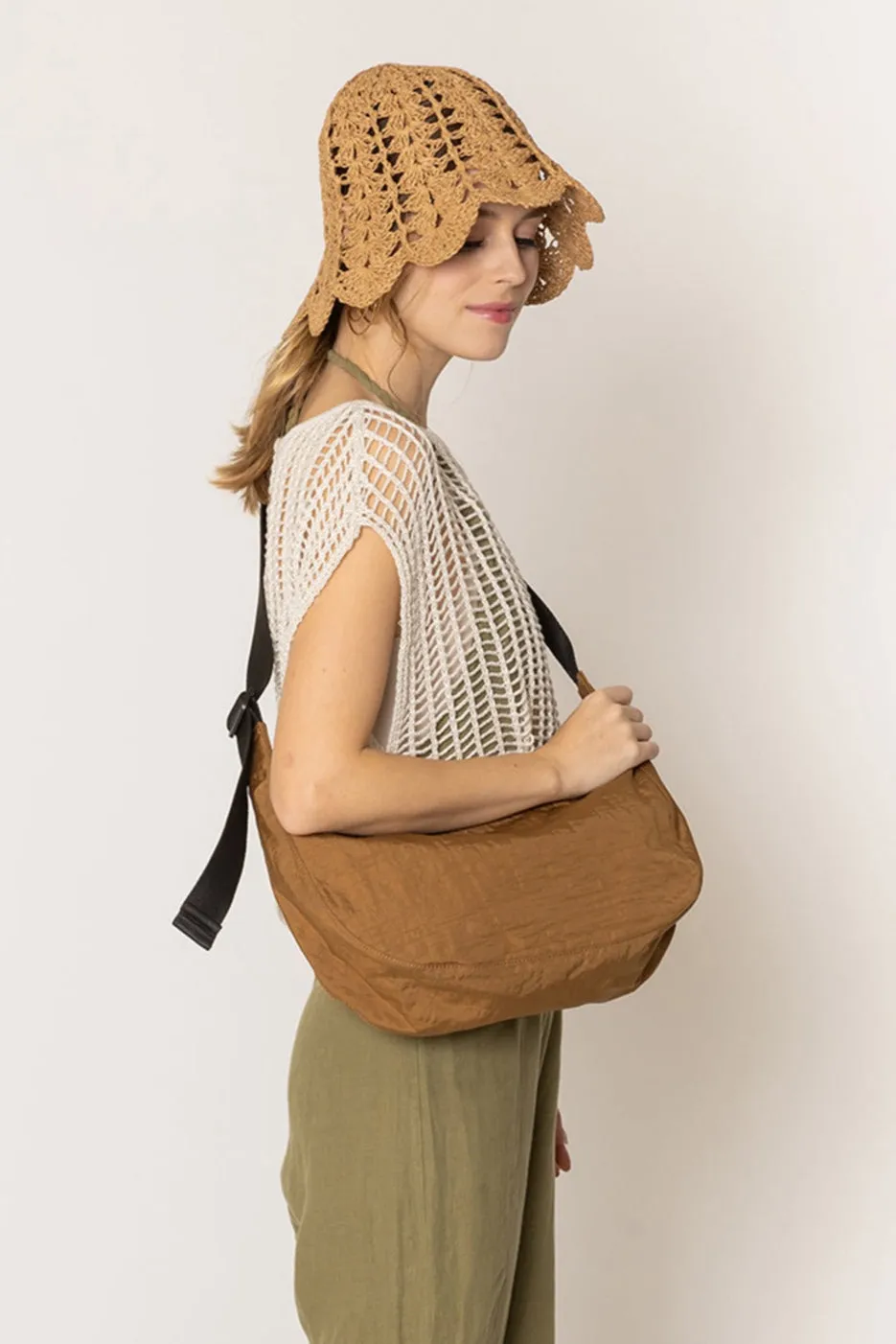 Crescent Bag sold by Charming Charlie