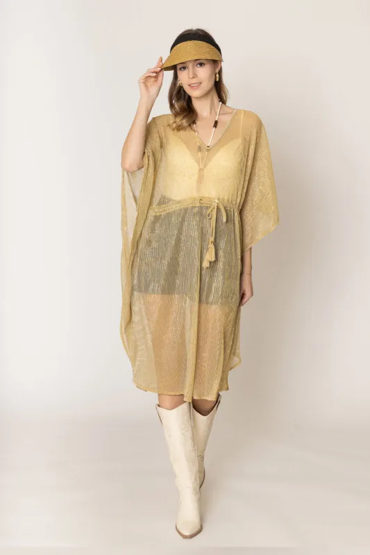 Lurex String Poncho sold by Charming Charlie
