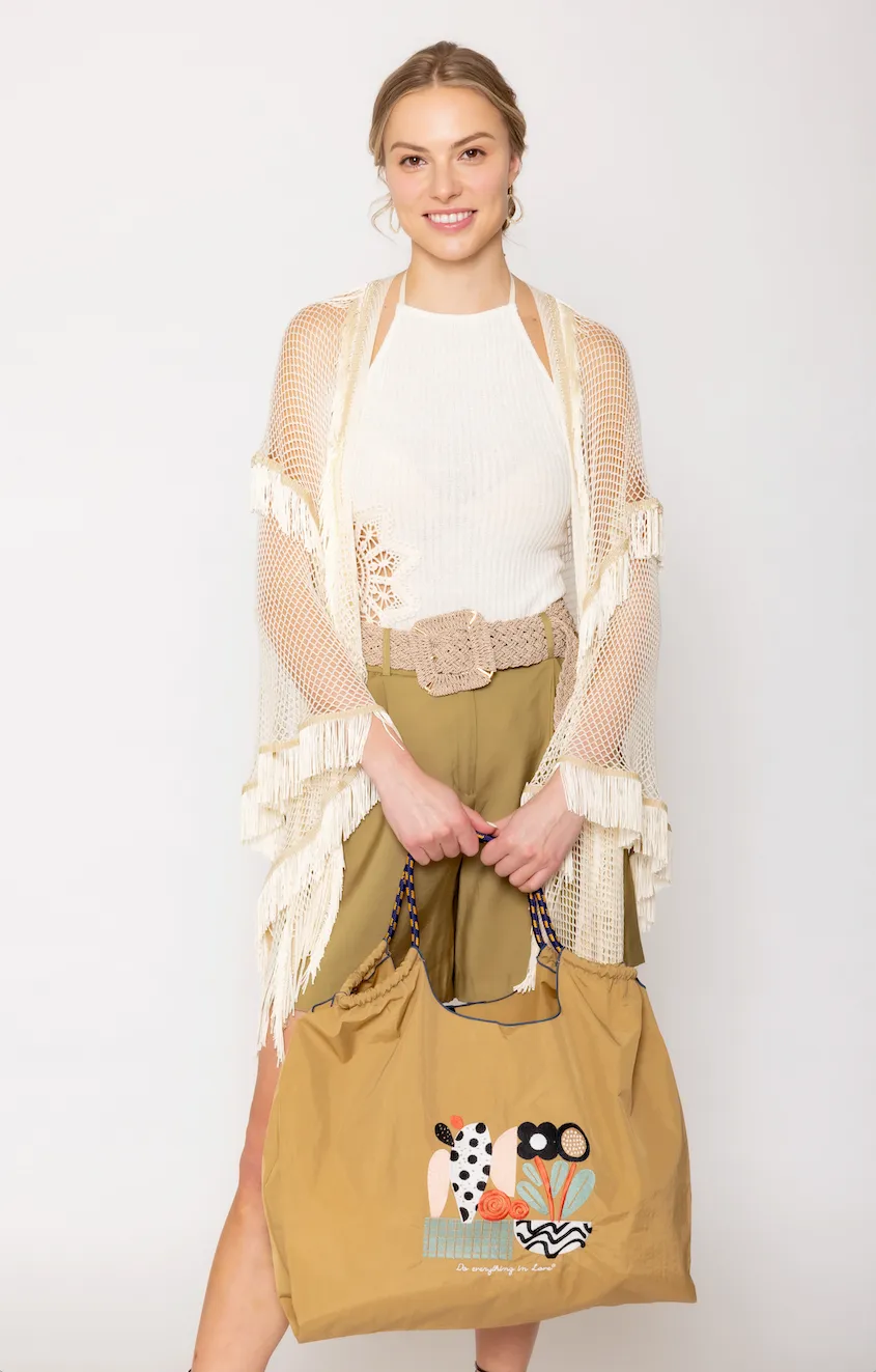 Flower Rope Bag sold by Charming Charlie