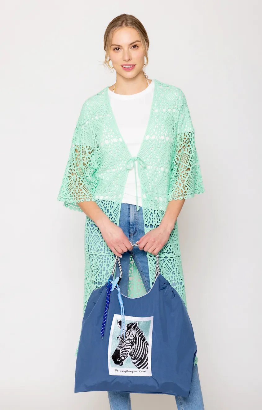 Zebra Rope Bag sold by Charming Charlie