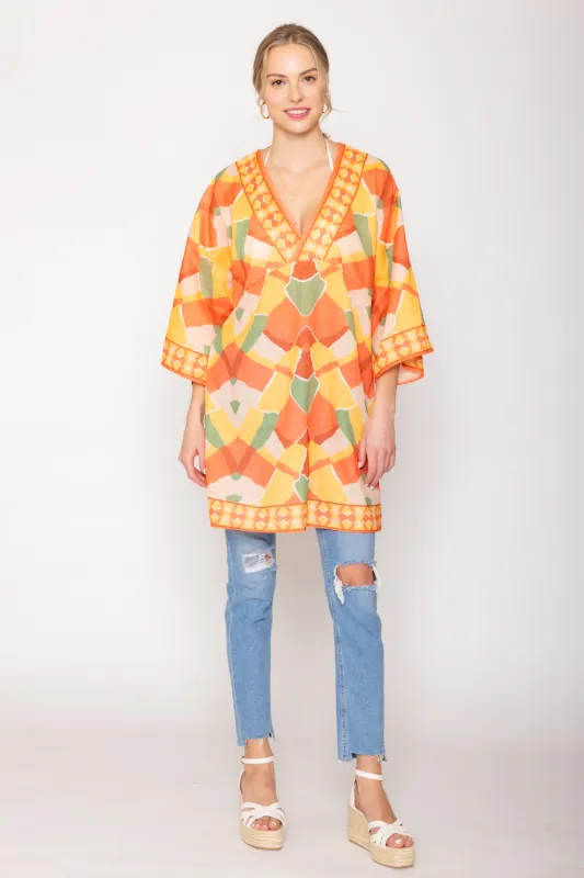 Geometric Print Poncho sold by Charming Charlie