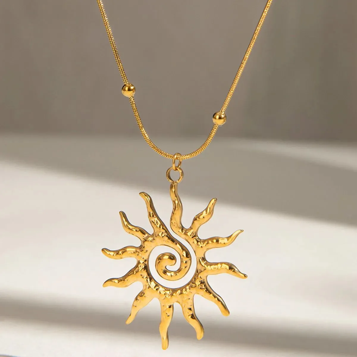 18K Gold-Plated Sun Pendant Necklace sold by Charming Charlie product image thumbnail 2