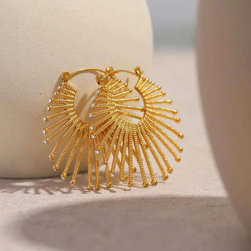 Golden Sunburst Fan Hoop Earrings sold by Charming Charlie