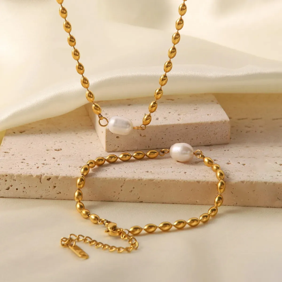Pearl and Gold Chain Jewelry Set with Necklace and Bracelet sold by Charming Charlie