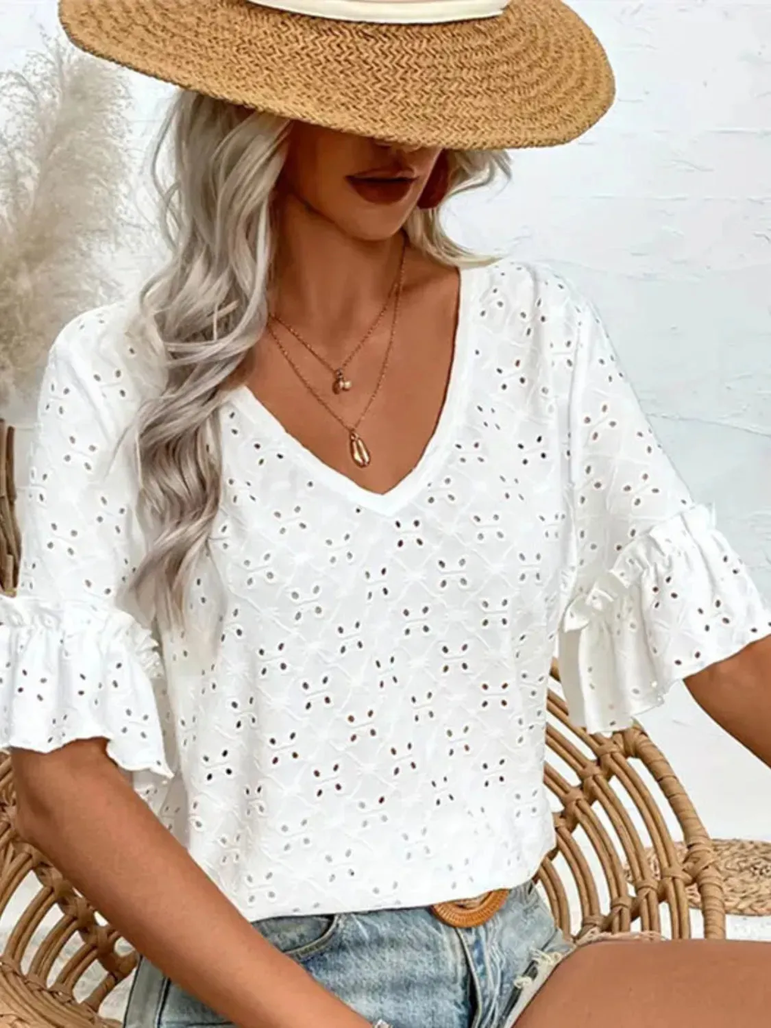 Eyelet V-Neck Half Sleeve Blouse sold by Charming Charlie product image thumbnail 4