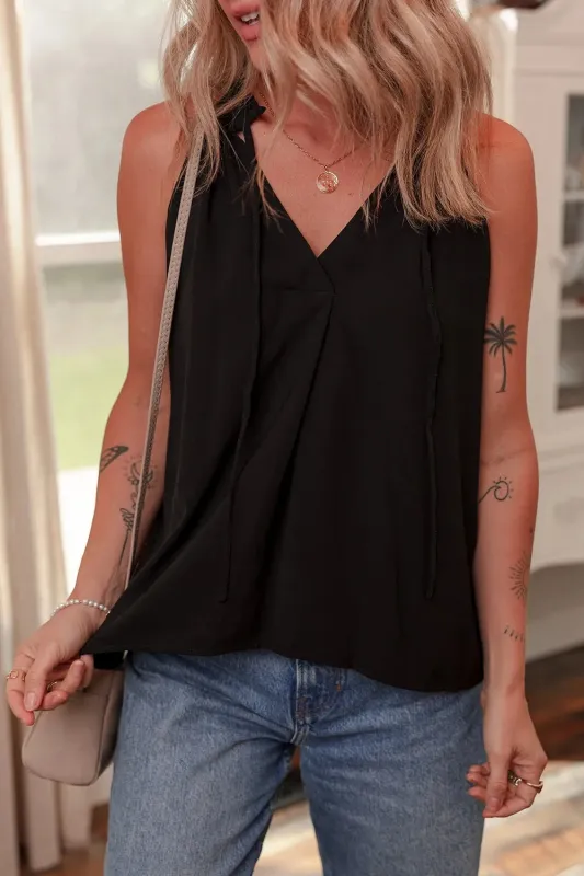 Pinched V Neck Tie Loose Tank Top sold by Charming Charlie