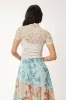 Davi & Dani Floral Mesh Mock Neck Short Sleeve Top sold by Charming Charlie