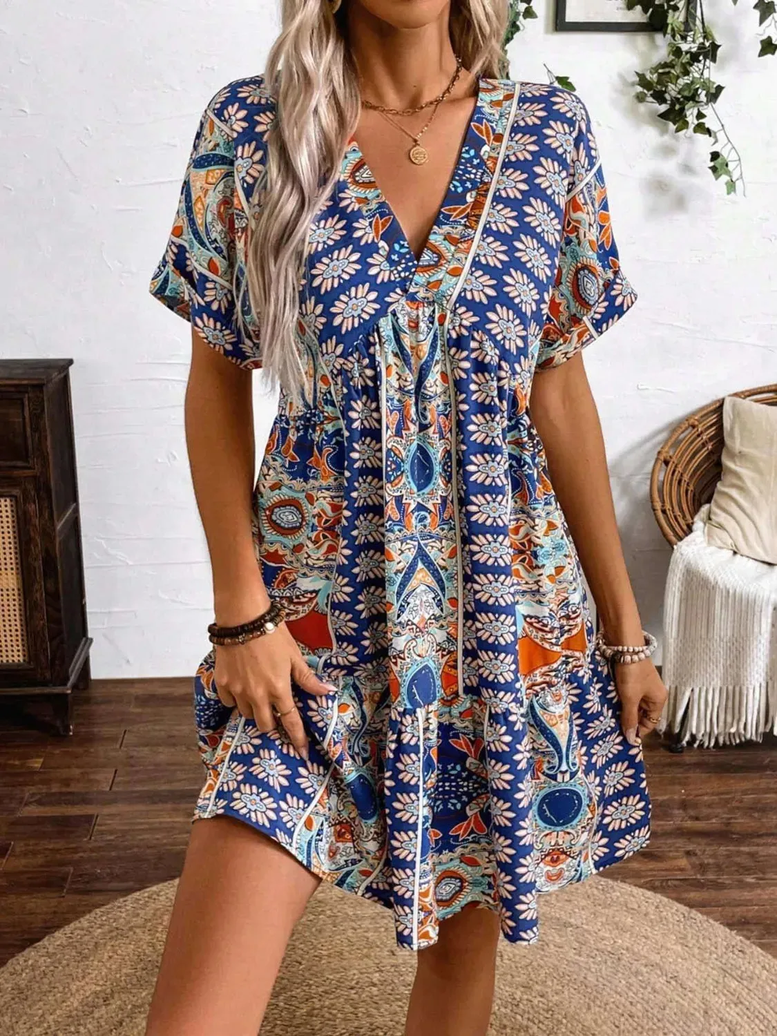 Printed V-Neck Short Sleeve Dress sold by Charming Charlie
