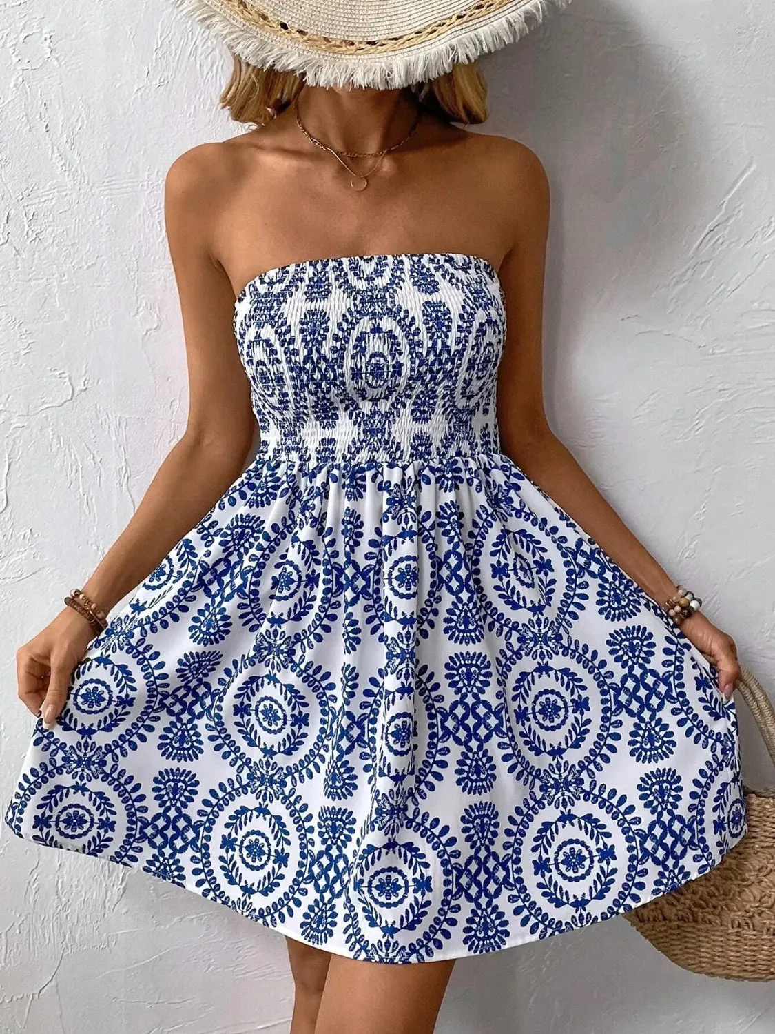Smocked Printed Tube Mini Dress sold by Charming Charlie