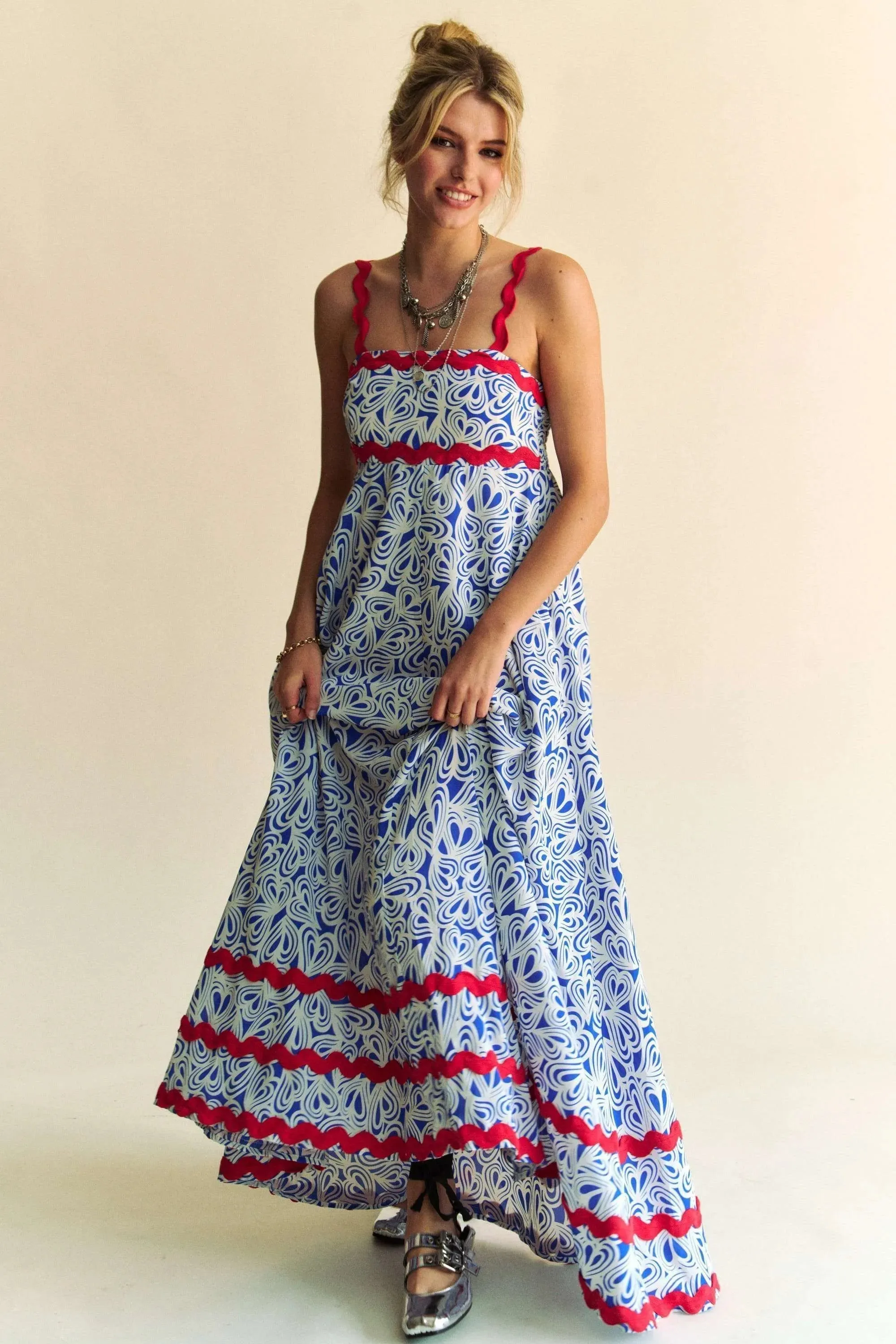 Davi & Dani Geo 2 Tone Printed Wavi Trim Tiered Maxi Dress sold by Charming Charlie