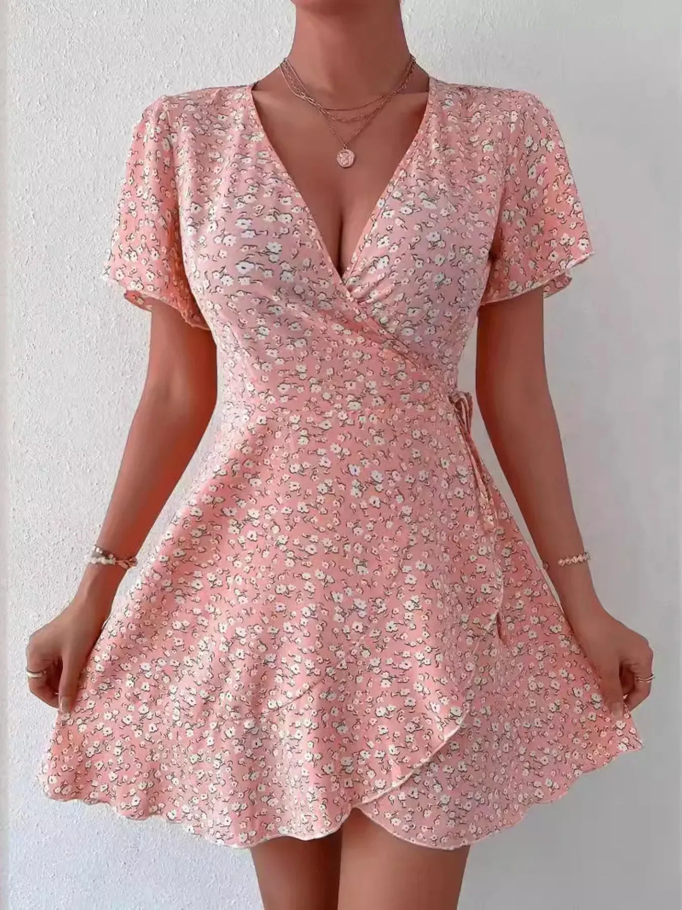 Floral Flutter Sleeve Wrap Mini Dress sold by Charming Charlie product image thumbnail 2