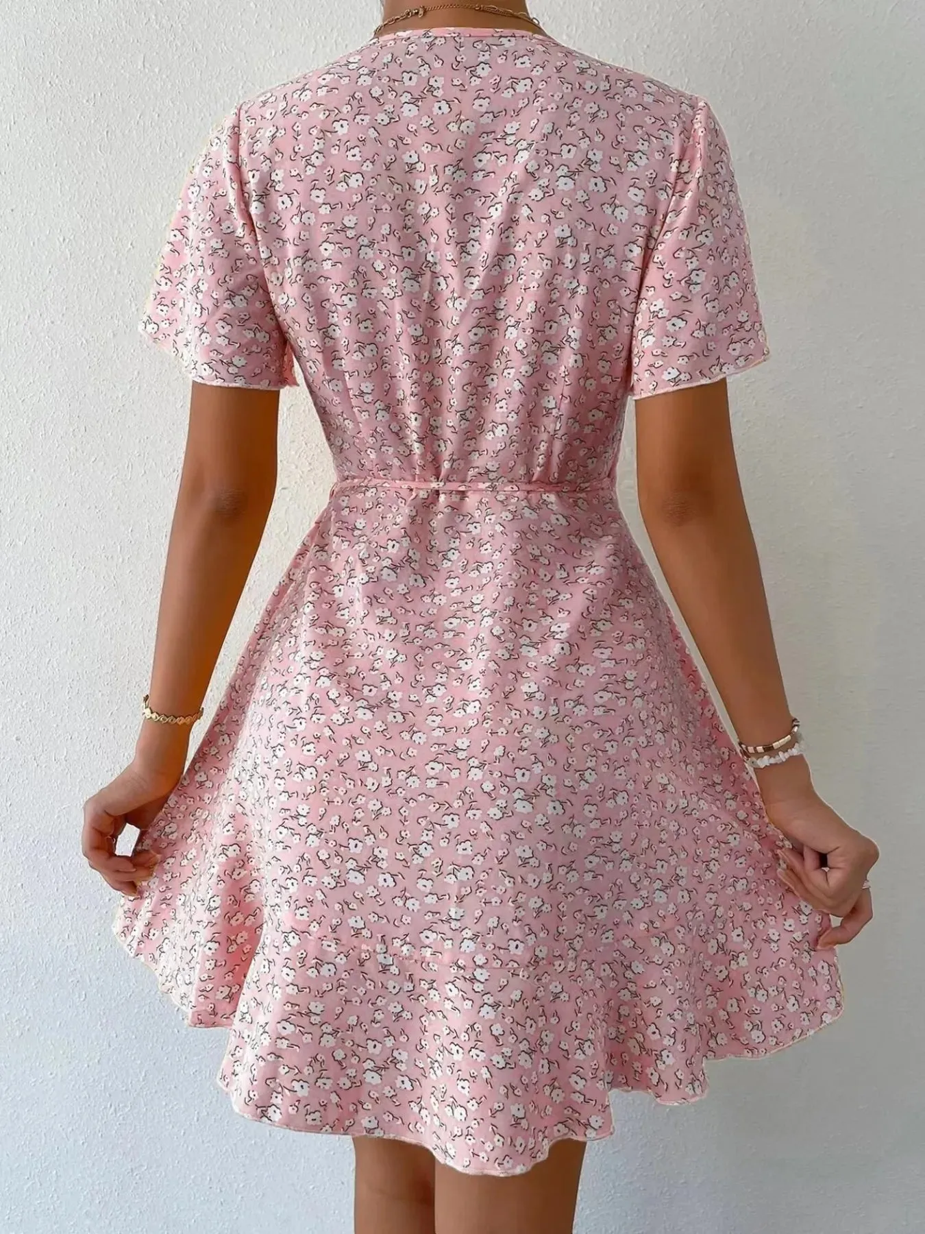 Floral Flutter Sleeve Wrap Mini Dress sold by Charming Charlie product image thumbnail 5
