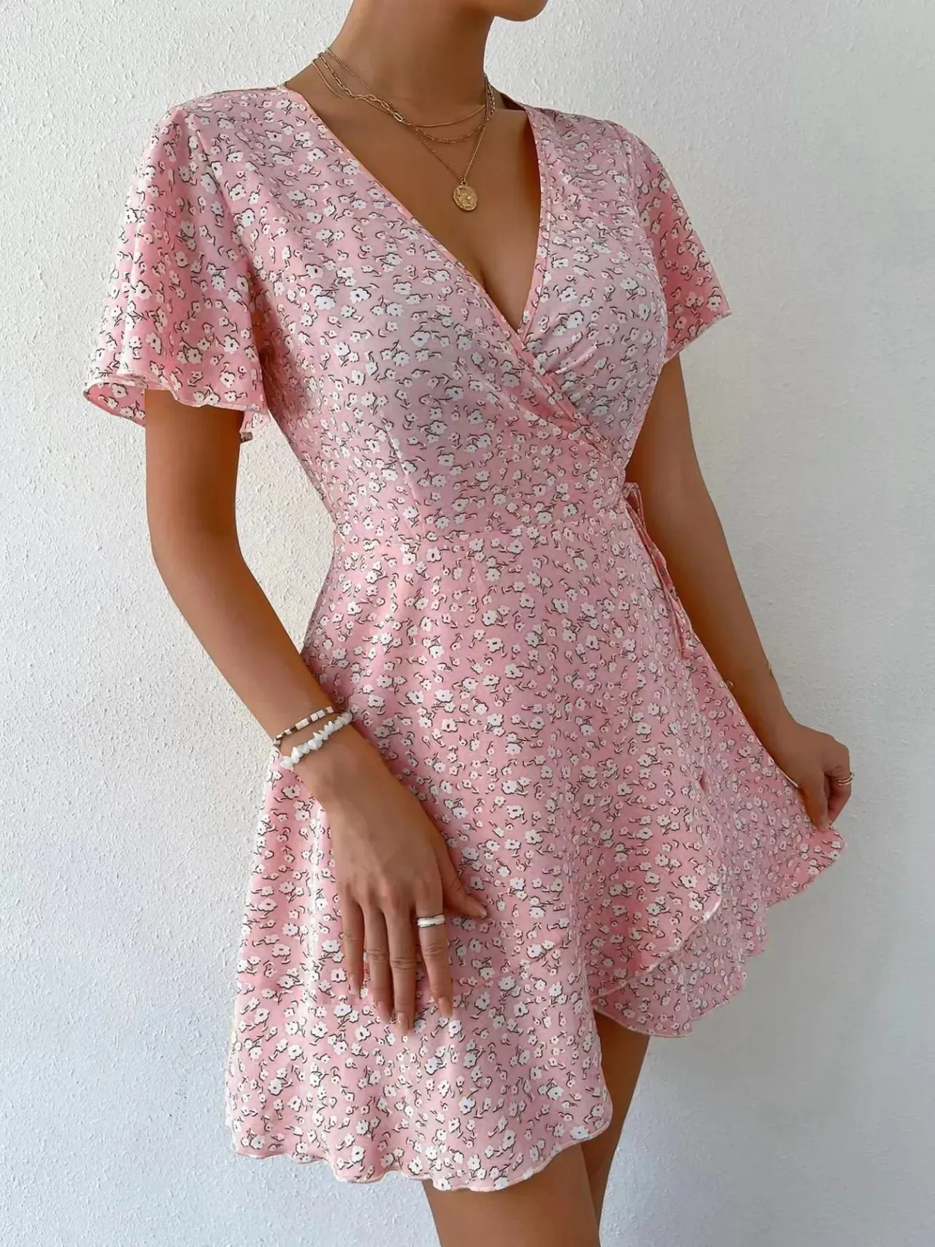 Floral Flutter Sleeve Wrap Mini Dress sold by Charming Charlie product image thumbnail 3