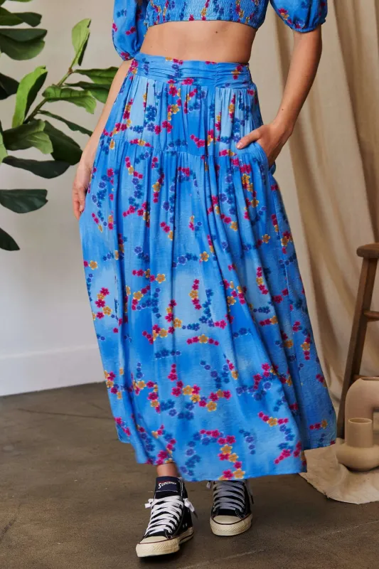 Davi & Dani Printed Smocking Waistband Ruffled Maxi Skirt sold by Charming Charlie