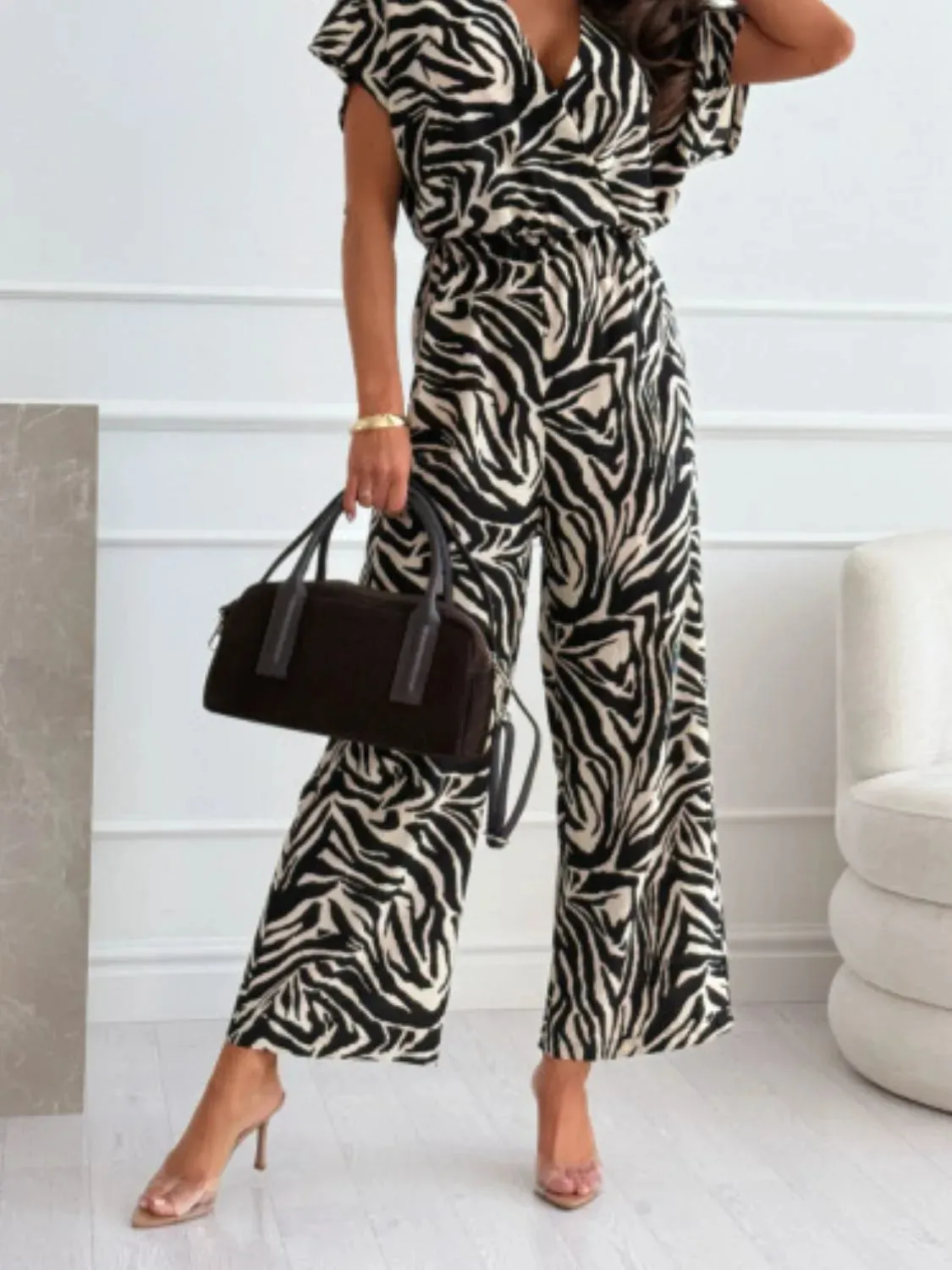 Leopard Print Short Sleeve Wide Leg Jumpsuit sold by Charming Charlie product image thumbnail 5