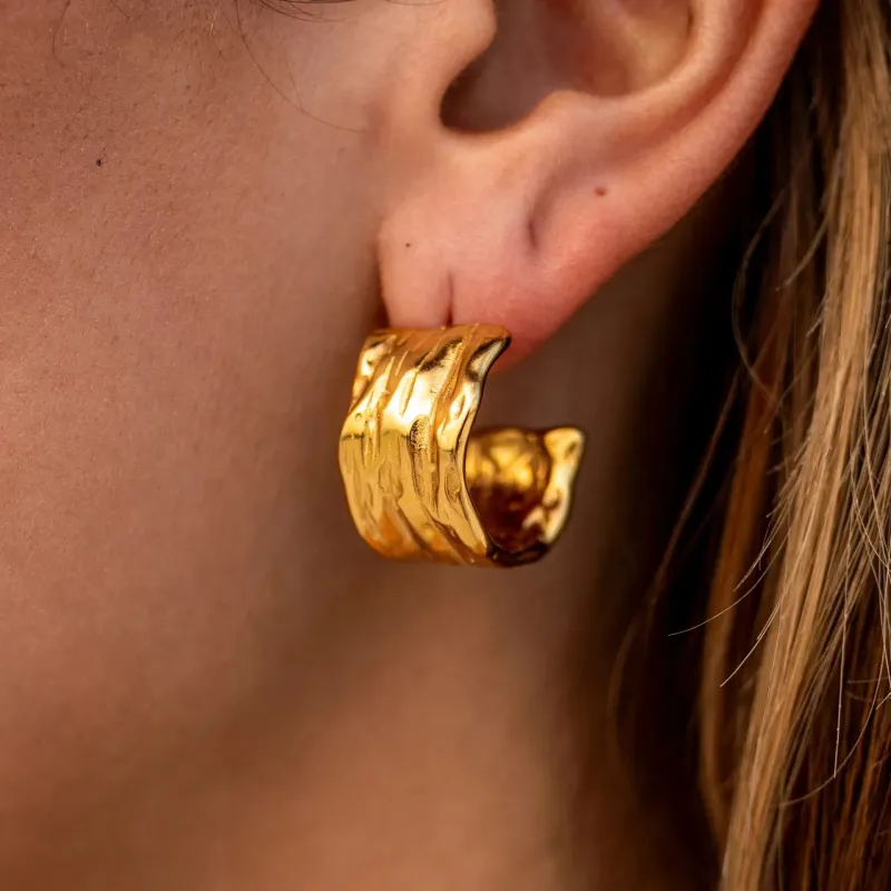 18K Gold-Plated Textured Chunky Hoop Earrings sold by Charming Charlie