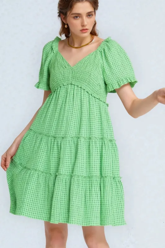 Davi & Dani Jacquard Checker Smocking Tiered Dress sold by Charming Charlie
