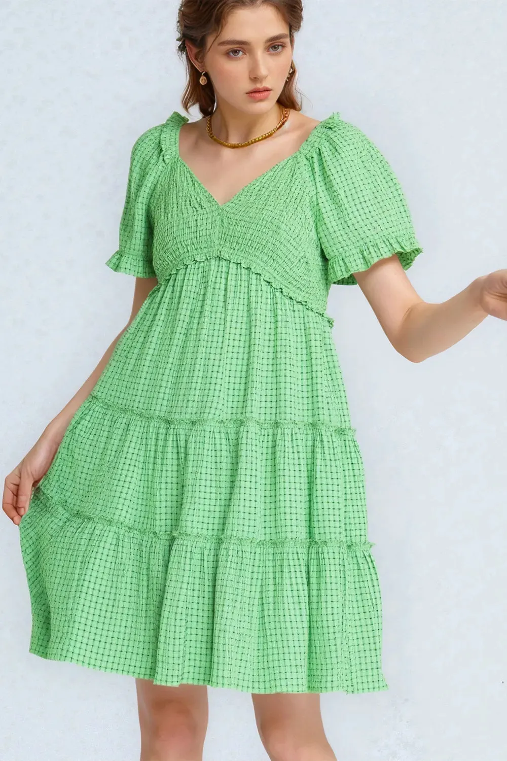 Davi & Dani Jacquard Checker Smocking Tiered Dress sold by Charming Charlie