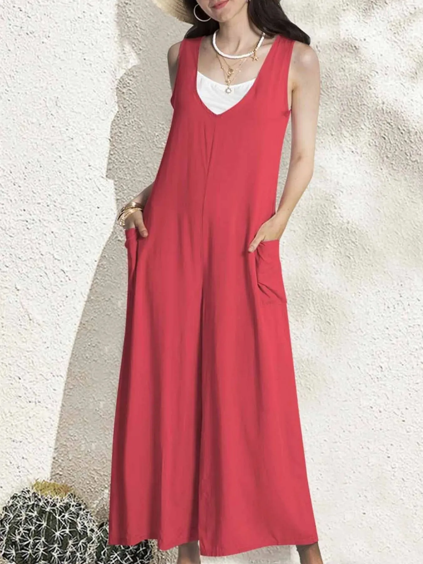 V-Neck Wide Leg Jumpsuit sold by Charming Charlie